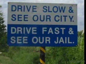 Savage road sign