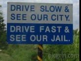 Savage road sign