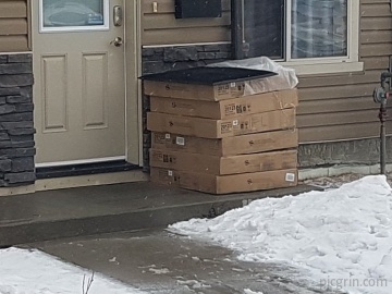 Courier: left package under doormat